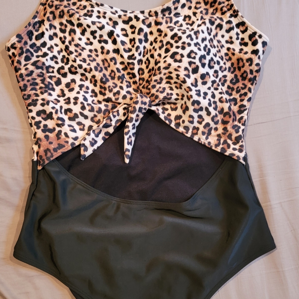 OXL one piece with center cutout.